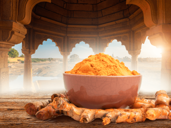 A Bowl Of Turmeric Image In Color in a Temple