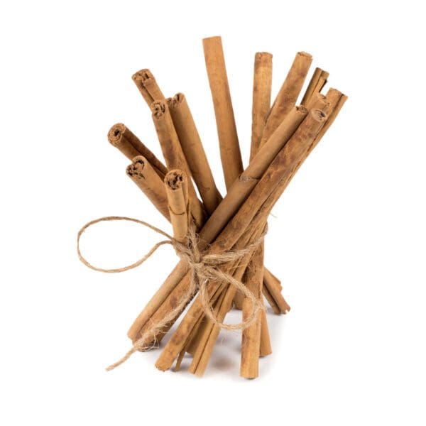 A bundle of cinnamon sticks tied with a jute rope.